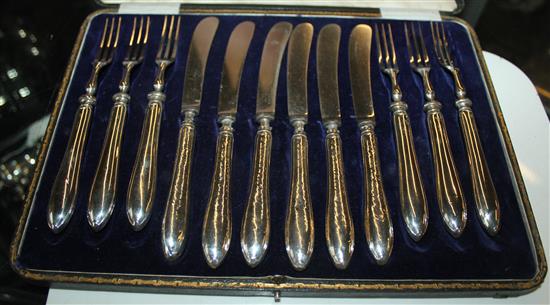 6 pairs of silver handled cake knives and forks